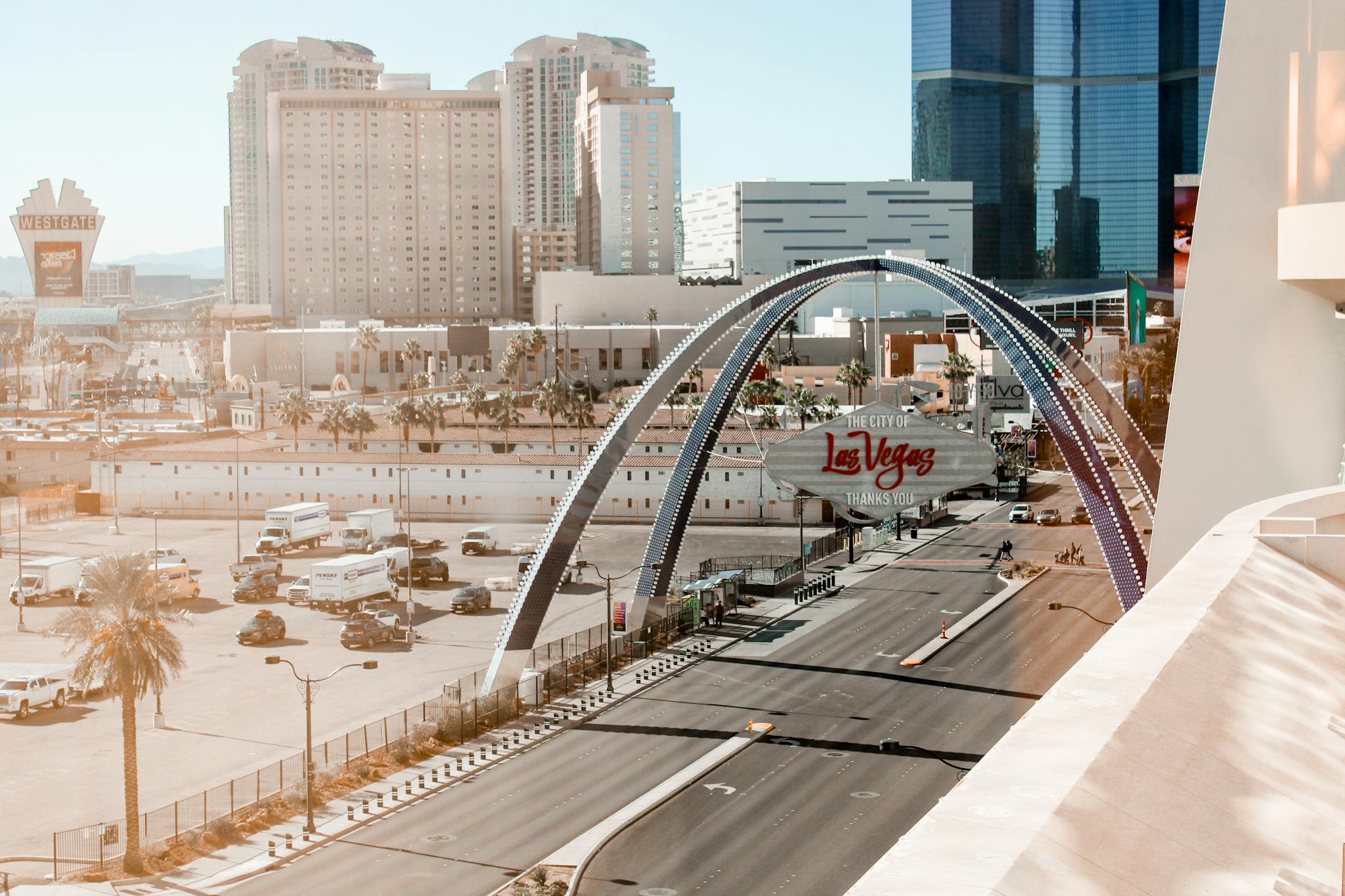 View of Las Vegas Boulevard featuring the iconic Las Vegas Welcome sign and cityscape.